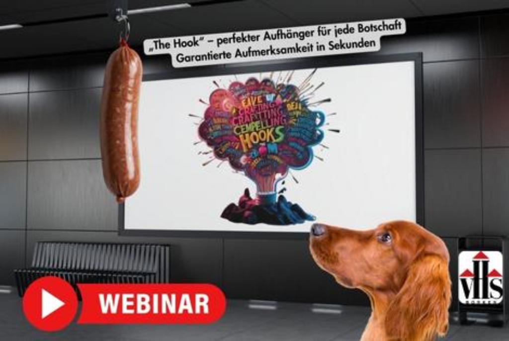Im Vordergrund ist ein Hund mit braunem Fell zu sehen, der aufmerksam nach oben blickt. Links oben hängt eine große Wurst an einer Schnur. Im Hintergrund befindet sich eine Werbetafel mit einer bunten Grafik, die einen Kopf mit farbigen Gedankenwolken zeigt. Darauf steht in großen Buchstaben: 'GIVE CREATIVITY BY CREATING CHEWING HOOKS'. Darüber ist ein deutscher Text zu lesen: '„The Hook“ – perfekter Aufhänger für jede Botschaft Garantierte Aufmerksamkeit in Sekunden'. Unten links befindet sich ein rotes Symbol mit einem weißen Pfeil und dem Schriftzug 'WEBINAR'. Rechts unten ist ein Logo mit den Buchstaben 'VHS' und einer stilisierten Säule.